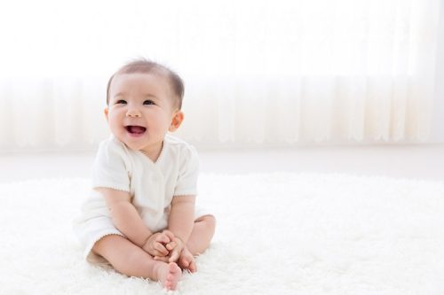 portrait of asian baby in living room portrait of asian baby in living room