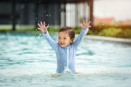 Happy,Toddler,Baby,Playing,Water,Splashing,In,The,Swimming,Pool Happy,Toddler,Baby,Playing,Water,Splashing,In,The,Swimming,Pool